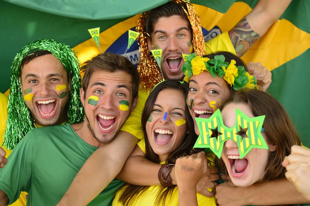 Happy Brazilians laughing all the way to the bank