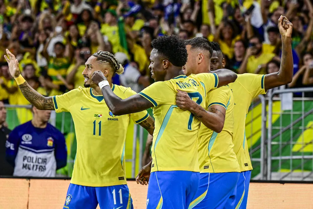 Brazilian players celebrate a goal