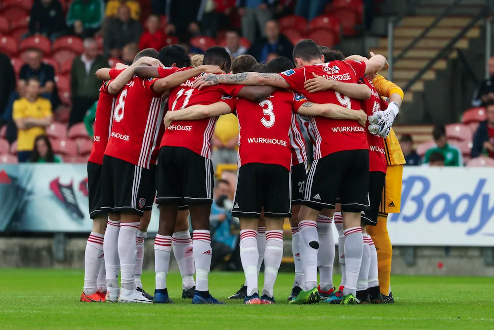 Derry City players fire each other up before a match