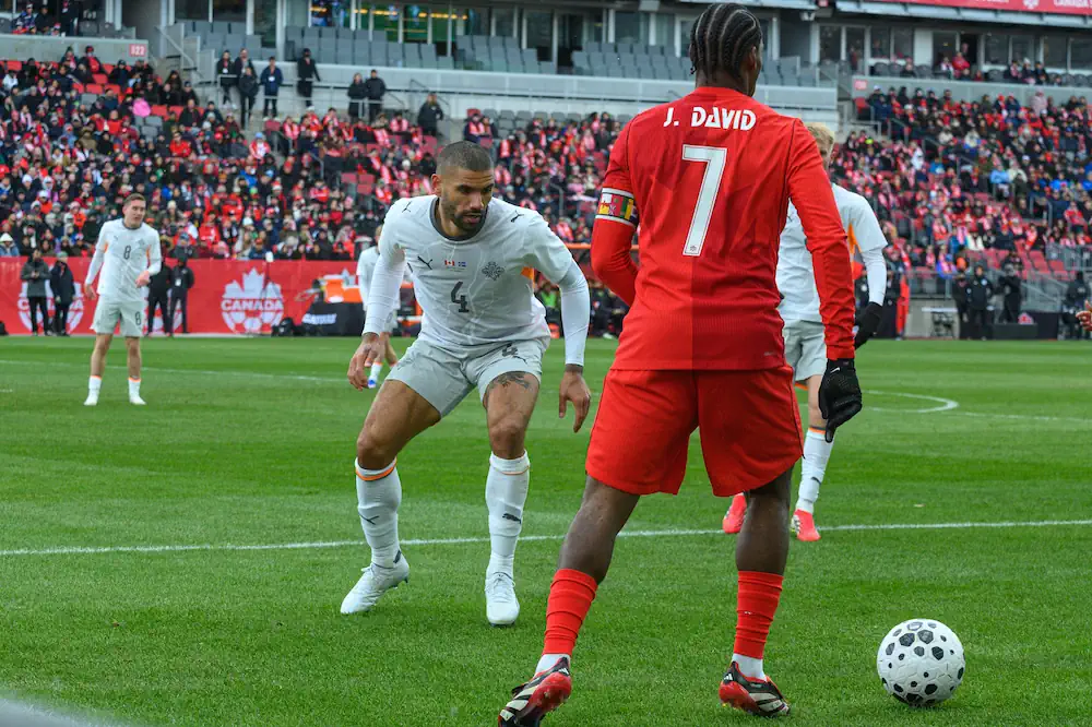 Jonathan David's back with name and number