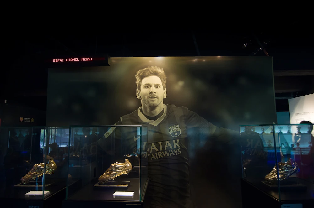 Lionel Messi golden shoes on display
