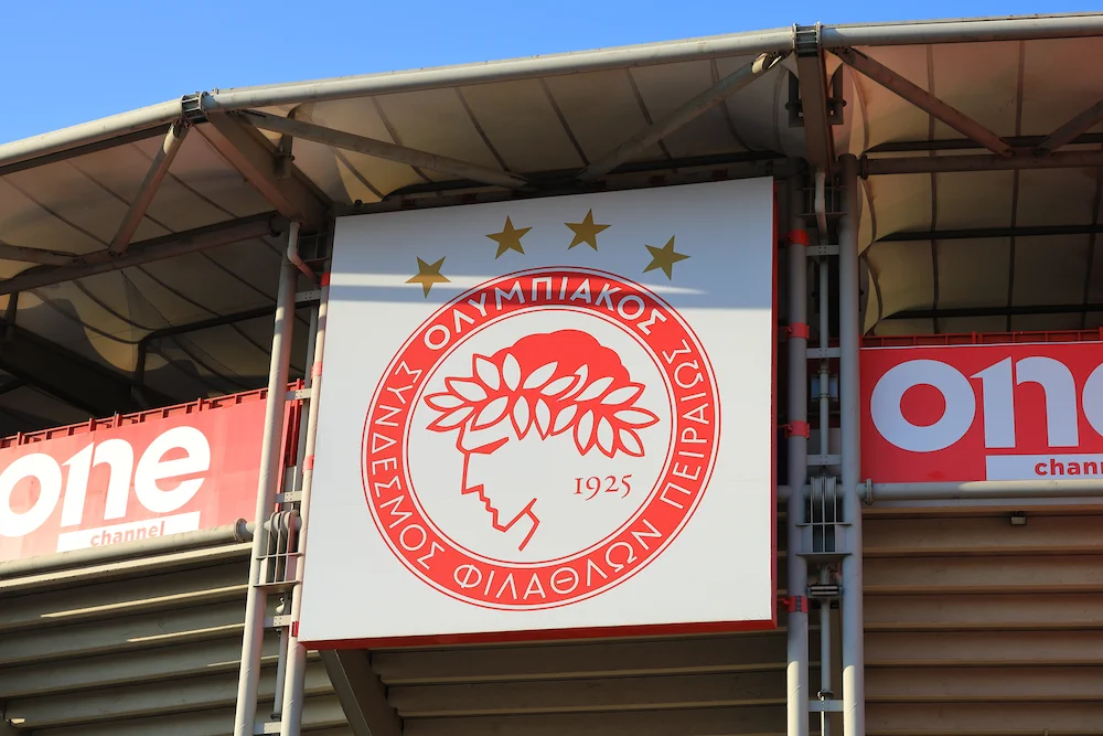 Olympiacos crest on the Karaiskakis Stadium wall