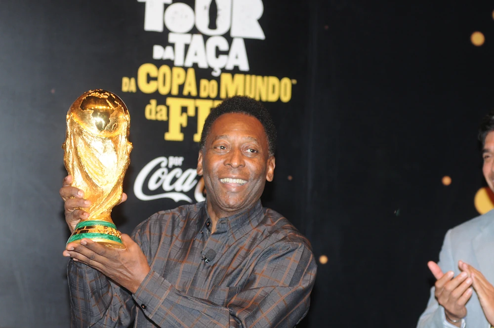Pelé - here holding the World Cup trophy in 2014