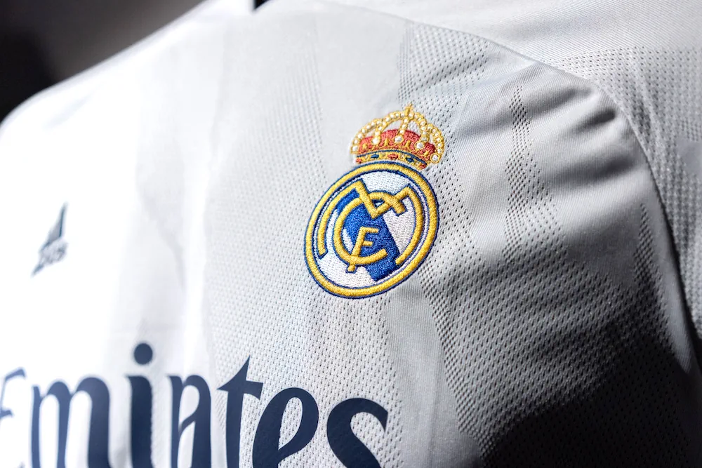 Real Madrid logo on a football shirt