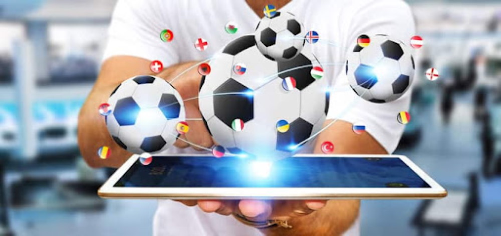 Footballs flying over a tablet