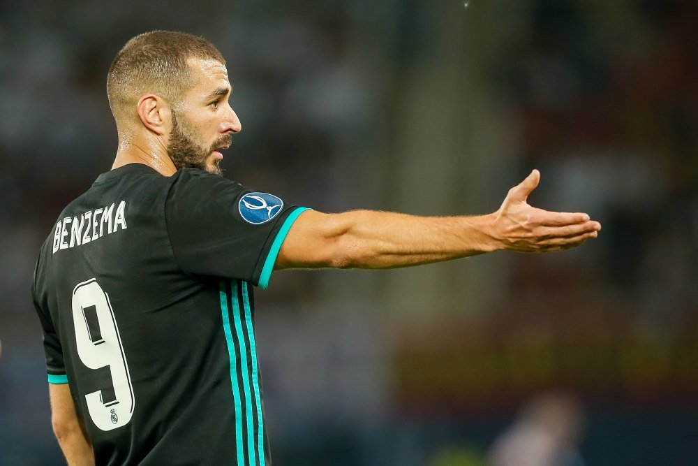 Karim Benzema - poiting towards the ball in the net after yet another goal
